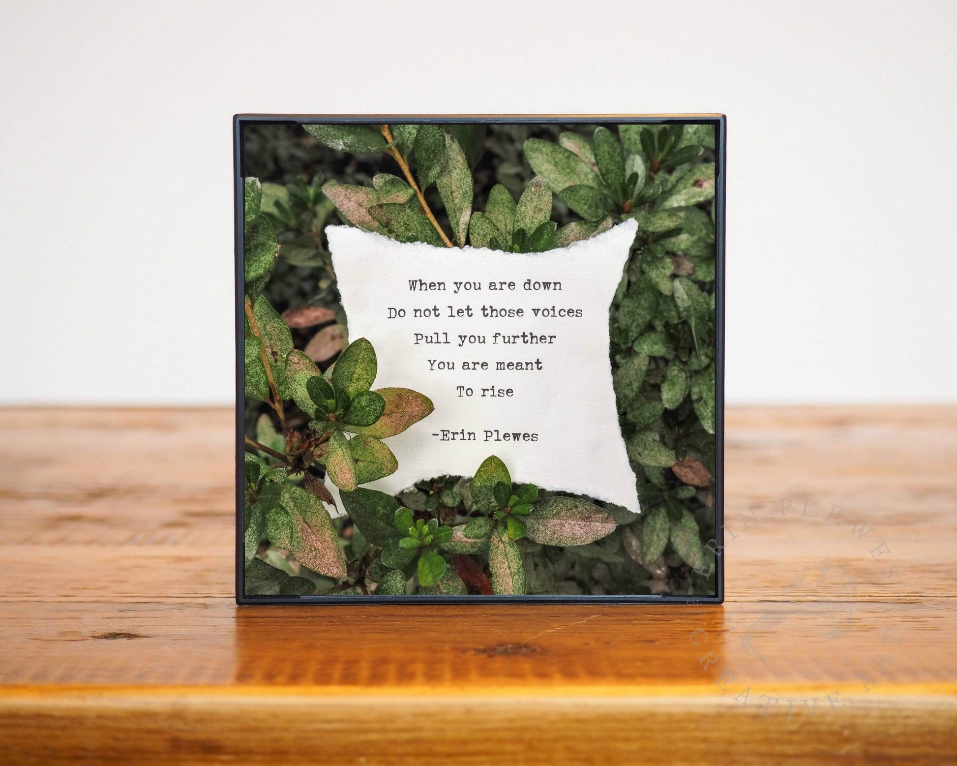 Rise Poem Green Leaves Artwork Framed on Brown Wood Table Erin Plewes Creative Art